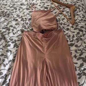 Blush jumpsuit with tie and criss cross back